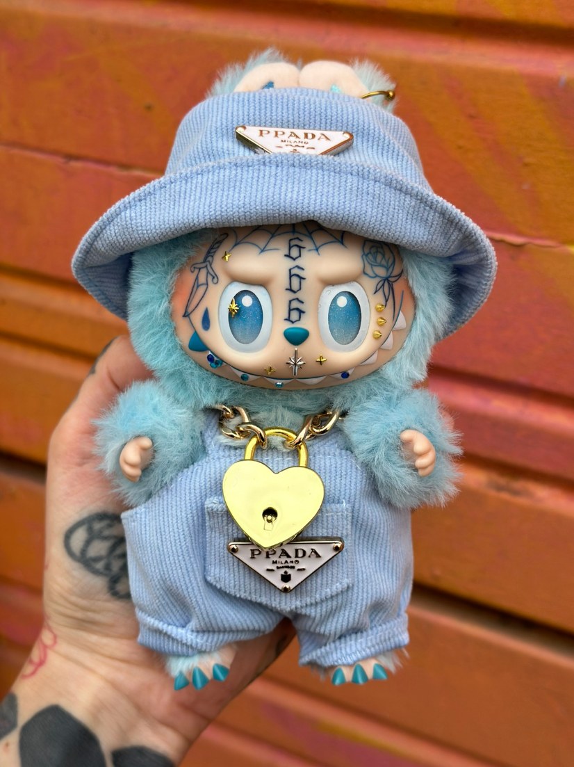 Custom Labubu with hand-drawn face tattoos by Tia Berry
