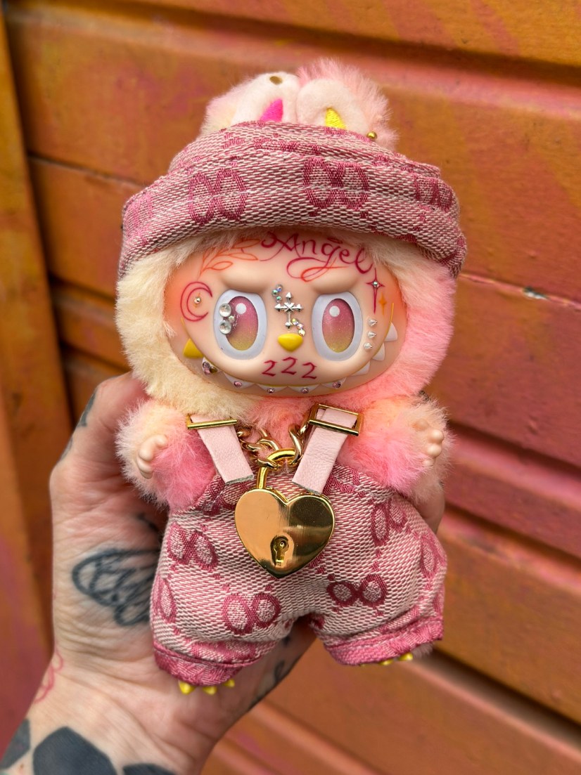 Custom Labubu with hand-drawn face tattoos by Tia Berry