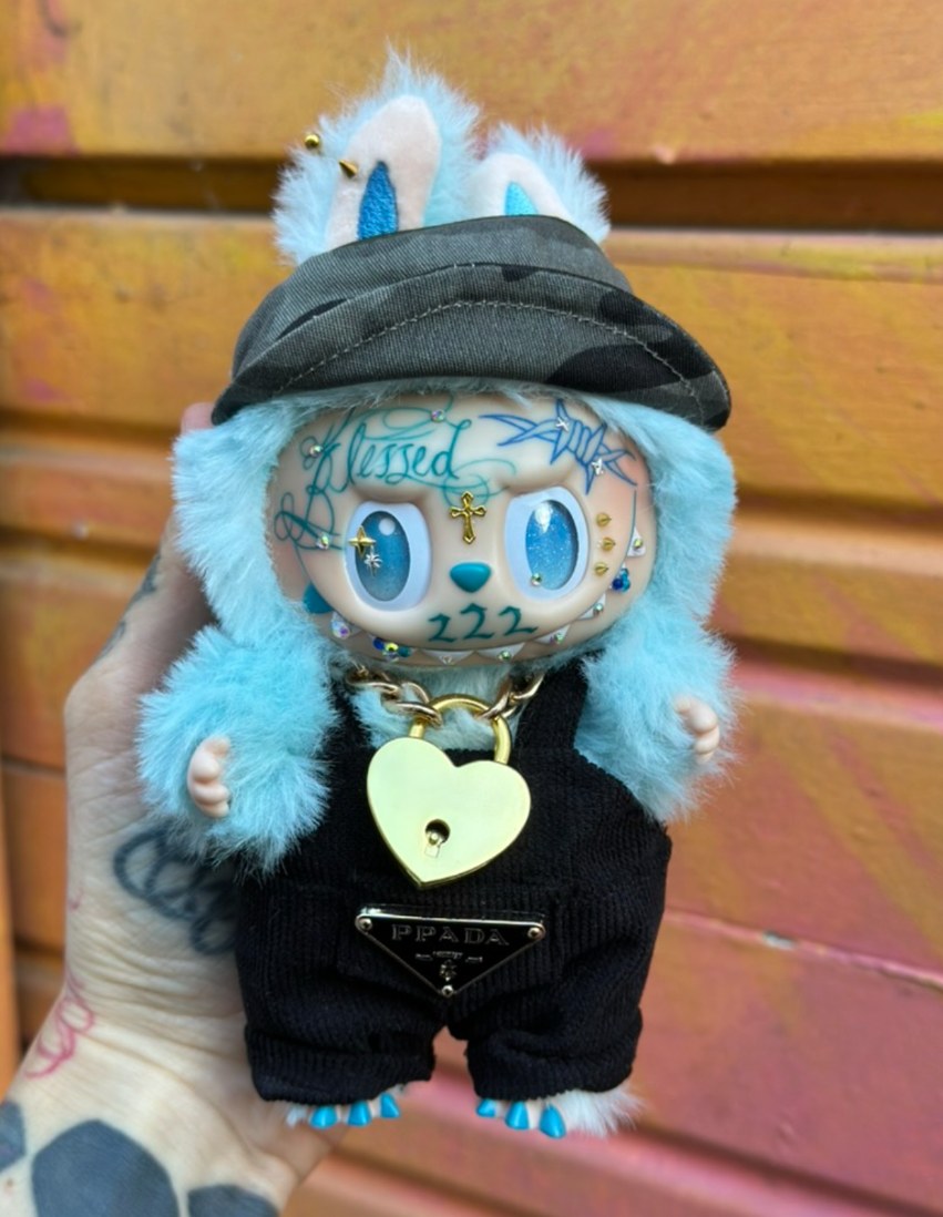 Custom Labubu with hand-drawn face tattoos by Tia Berry