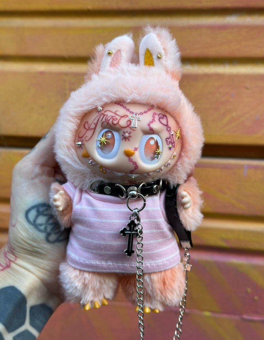 Custom Labubu with hand-drawn face tattoos by Tia Berry