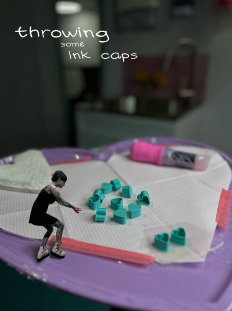 Mini Tia Berry figure throwing some ink caps on her heart tattoo tray