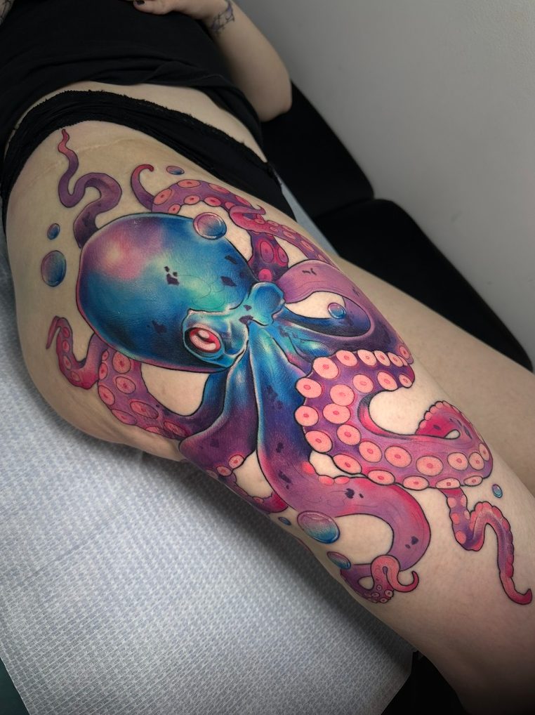Octopus tattoo on the hip by Tia Berry, colour tattoo artist in Vancouver
